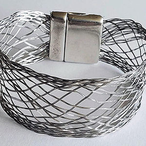 Woven metal bracelet.